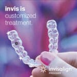 Invisalign Clear Dental Aligners Being Held - Trade Winds Dental