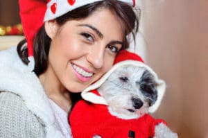 smiling girl with puppy