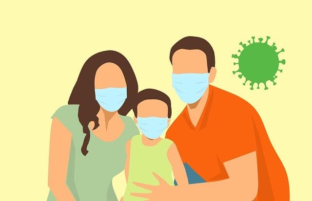 Family With Face Mask Covering - Trade Winds Dental