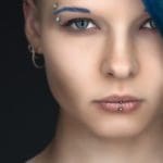 young woman with facial piercing