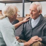 woman comforts man with dementia