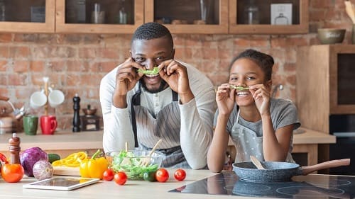 Father And Daughter Having Fun - Trade Winds Dental