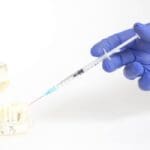 Dentist Administers Sedative Syringe To Practice Model Teeth - Trade Winds Dental